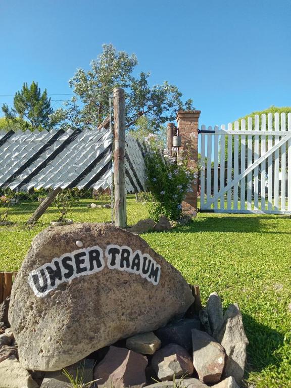 a rock with the word unseenrams written on it at UNSER TRAUM in Concordia
