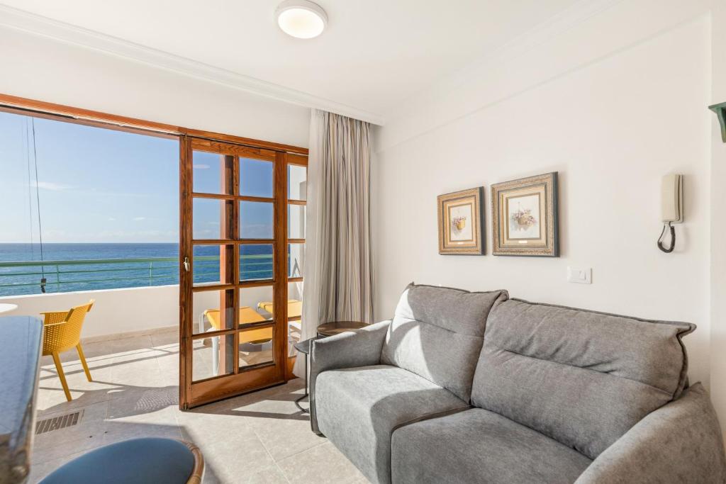 Posezení v ubytování Playa Delphin 305