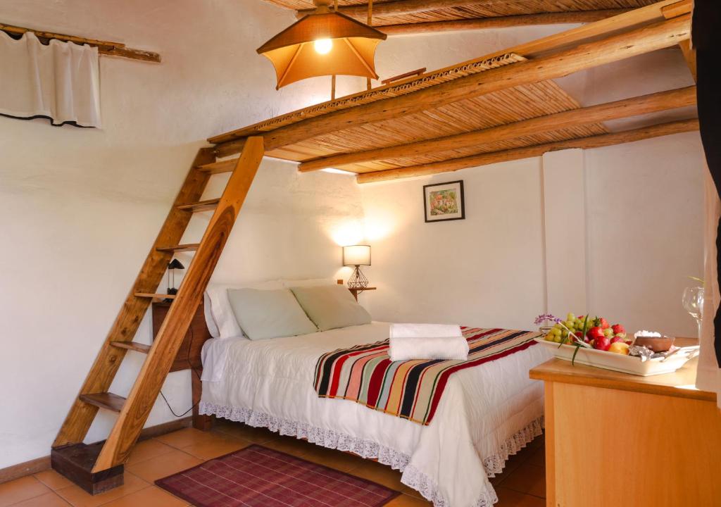 Giường trong phòng chung tại La Selenita