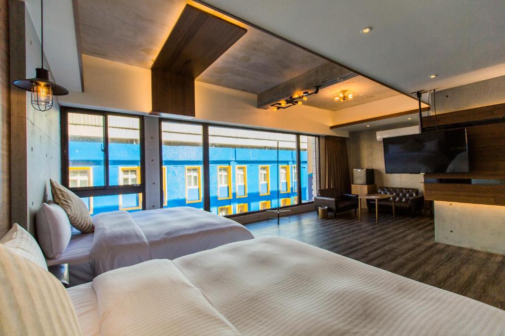 Postel nebo postele na pokoji v ubytování 慢空間