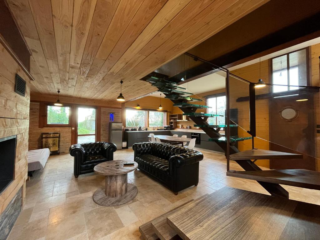 Khu vực ghế ngồi tại L'Atelier Cosy & moderne, terrasse près nature