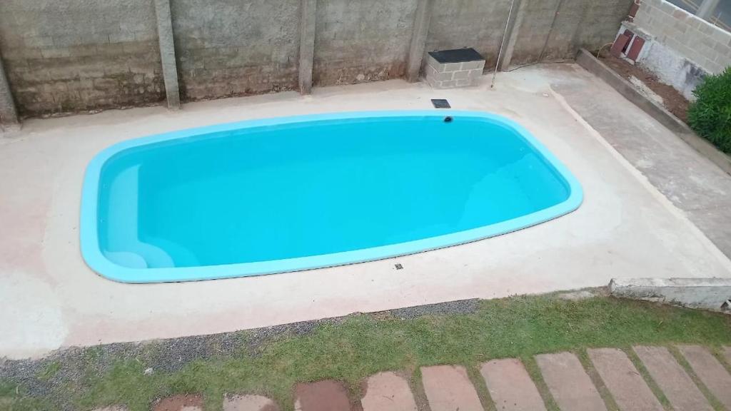 Swimmingpoolen hos eller tæt på Chácara Aconchego da Serra