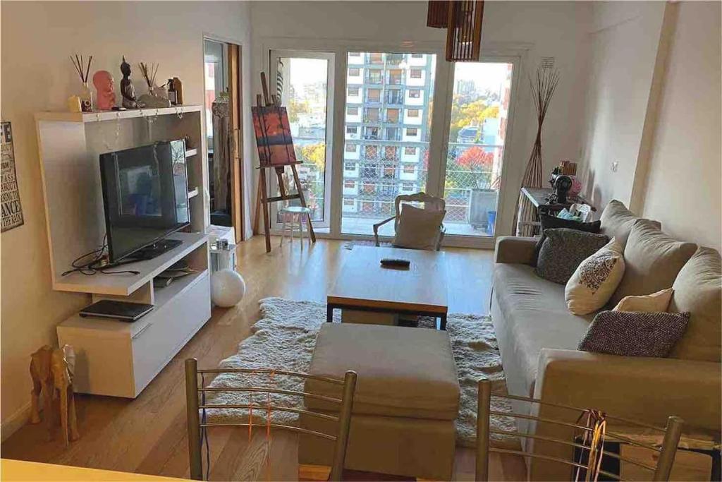 TV/trung tâm giải trí tại depto con seguridad y pileta, mi casa es tu casa, lo de Dani