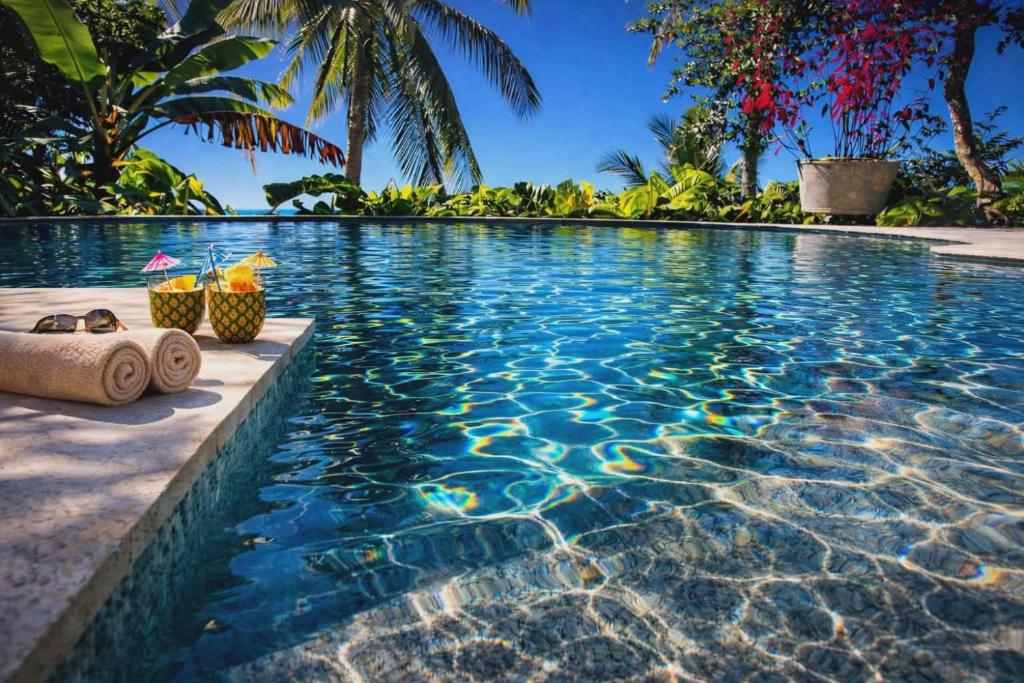 Swimmingpoolen hos eller tæt på Le temps d'un repos