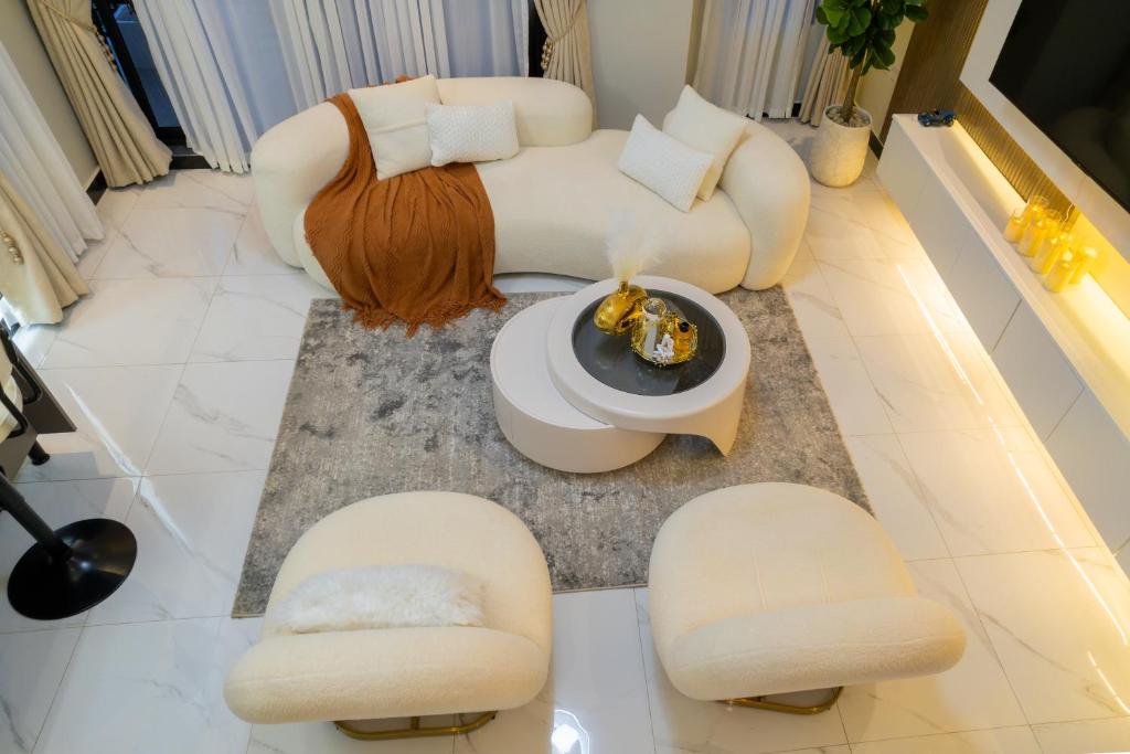 Posezení v ubytování Ivys Cozy Homes Kampala B6