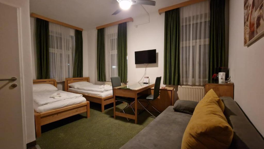 TV a/nebo společenská místnost v ubytování Aparthotel Mariazellerhof