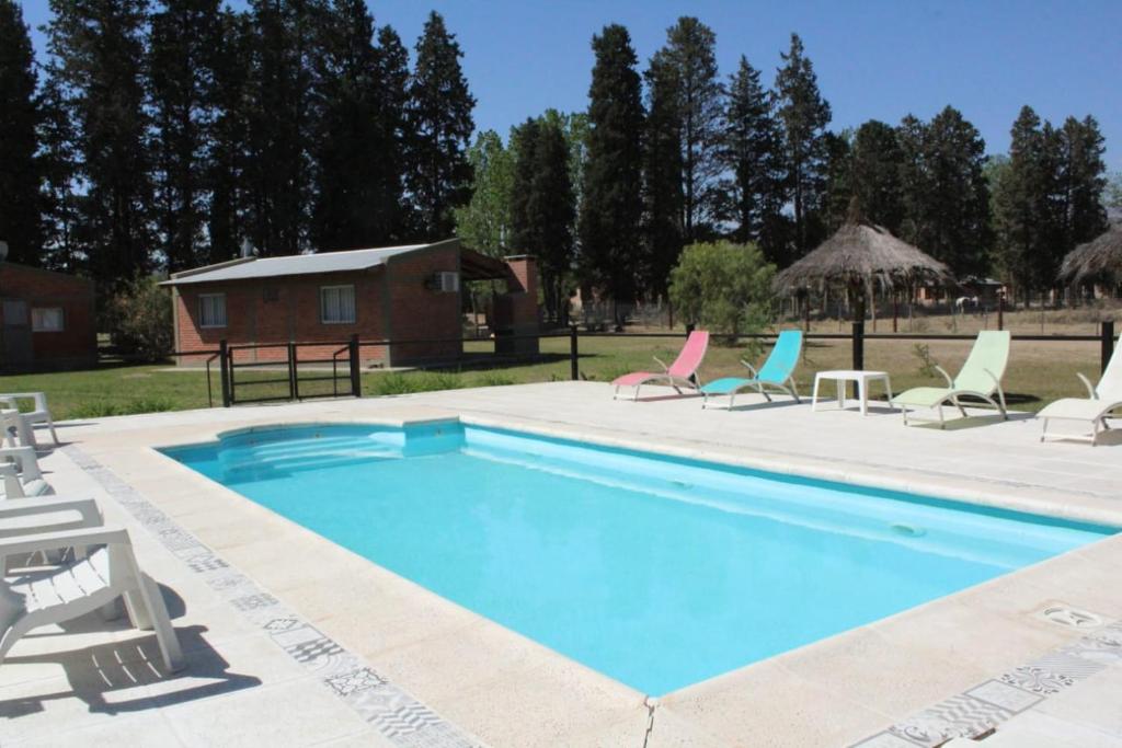 Bazén v ubytování Complejo cabañas Victor II nebo v jeho okolí