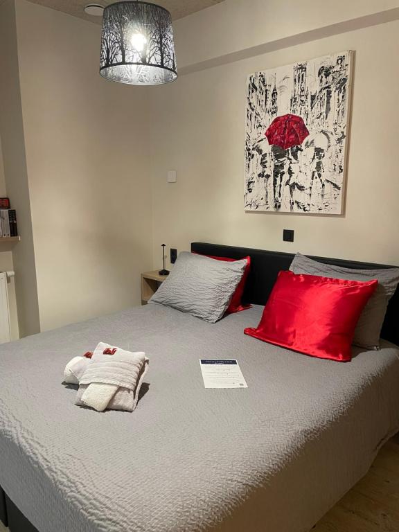 En eller flere senge i et værelse på Luxe Suite Brugge Centrum met Parking en Zen Terras