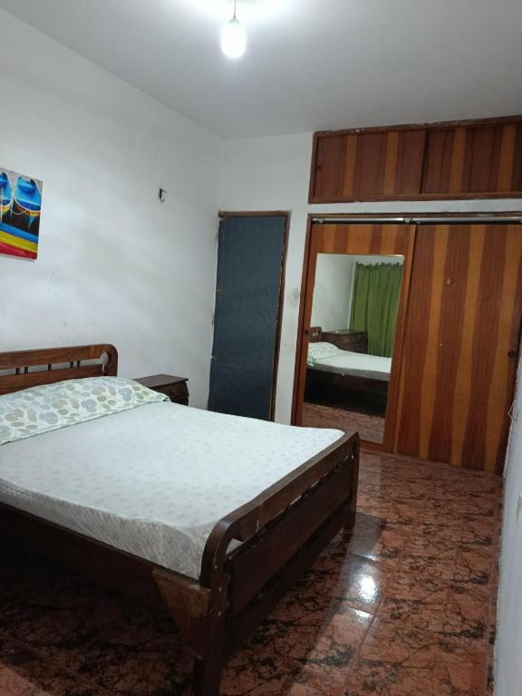 Postel nebo postele na pokoji v ubytování Casa cerca a la playa y al aeropuerto