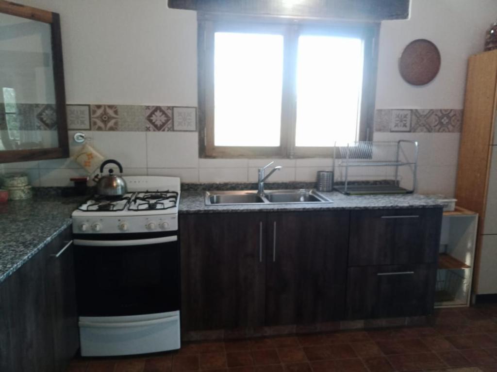 Køkken eller tekøkken på Casa de campo La Chunia