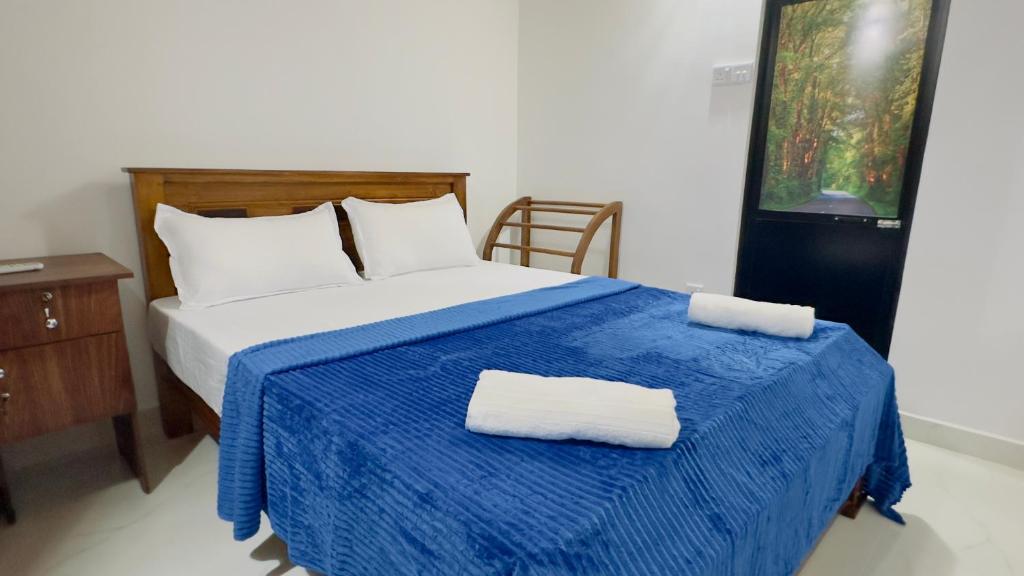 Ένα ή περισσότερα κρεβάτια σε δωμάτιο στο My Transit Stay Hotel
