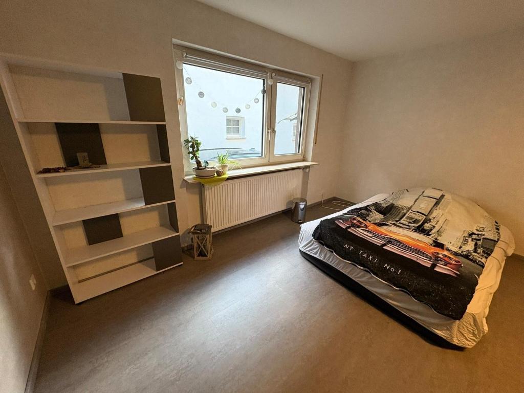 Postel nebo postele na pokoji v ubytování Gemütliches Zimmer im Pfälzer Land Zimmer Nr 2