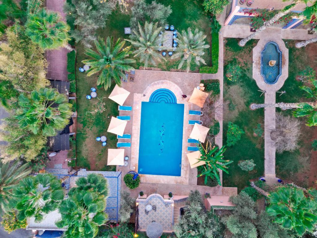 Bazén v ubytování RIAD REDWAN nebo v jeho okolí