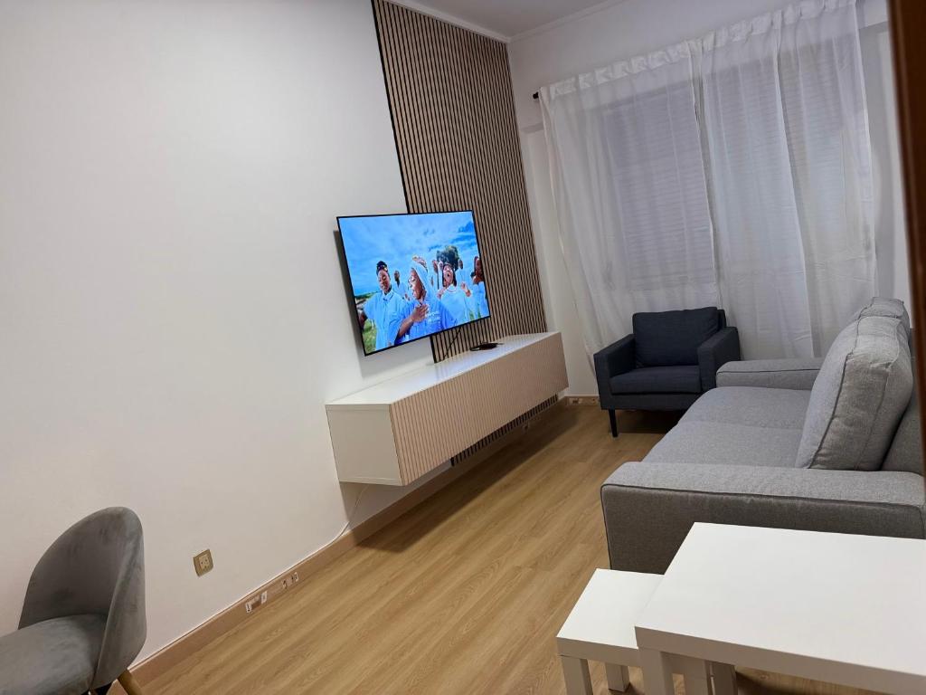 Et tv og/eller underholdning på Apartamento T2 Odivelas remodelado