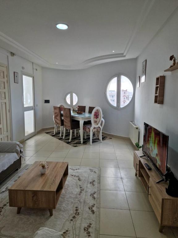 Et opholdsområde på Appartement Hammem Sousse Cosy