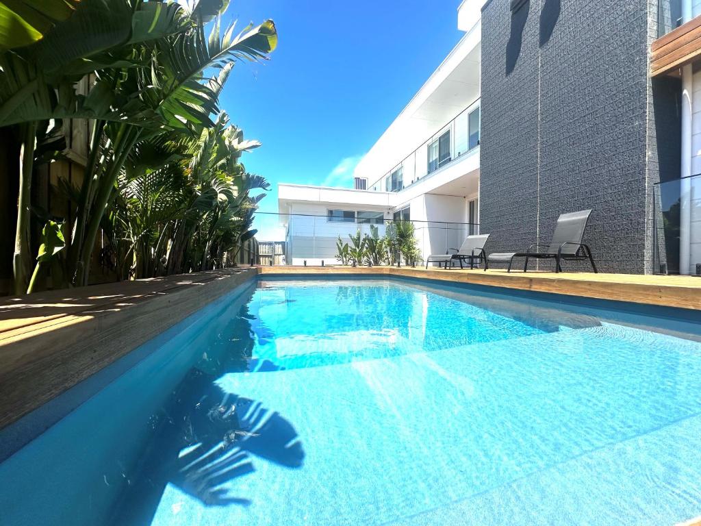 Bazén v ubytování Beach Escape with Heated Pool and Coastal Comfort nebo v jeho okolí