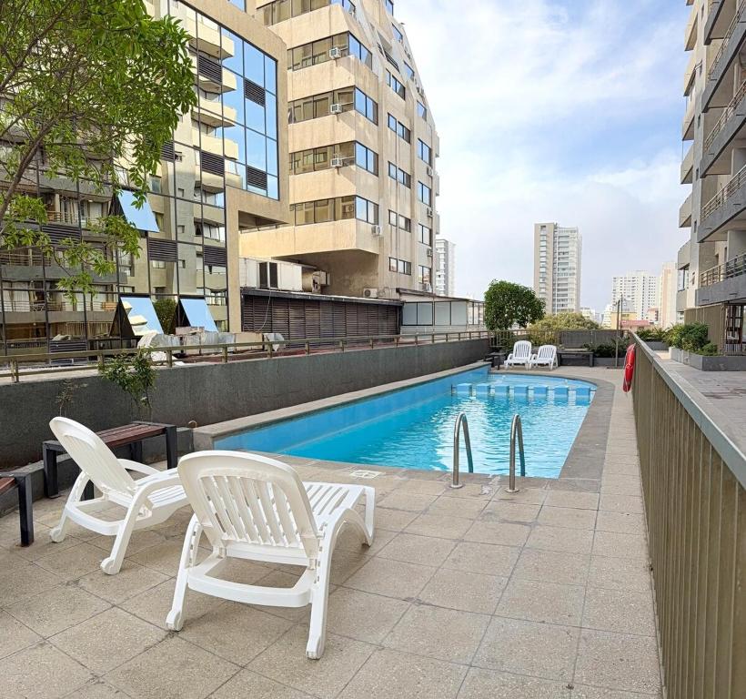 Hồ bơi trong/gần Departamento 1 habitación pleno centro de Viña