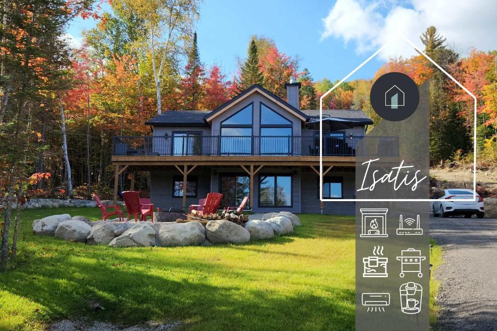 a house with a sign in front of it at Chalet Isatis - SPA - Access to the Lake in Saint Come