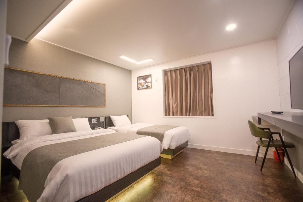 Postel nebo postele na pokoji v ubytování Major Hotel 2