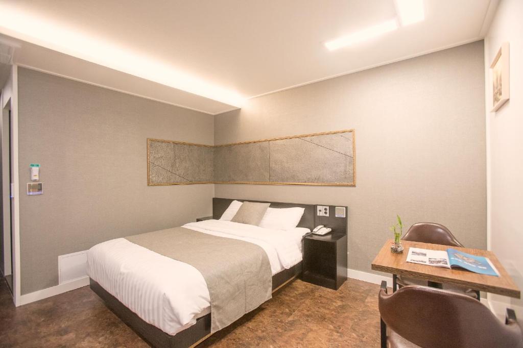 Postel nebo postele na pokoji v ubytování Major Hotel 2
