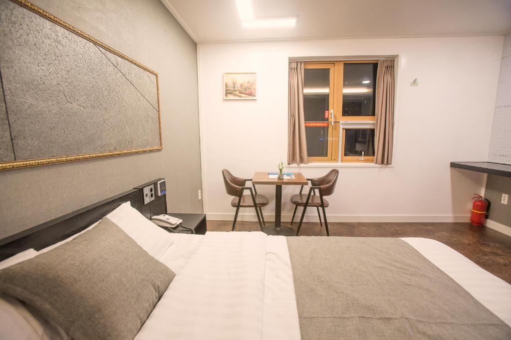 Postel nebo postele na pokoji v ubytování Major Hotel 2
