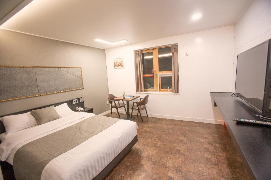 Postel nebo postele na pokoji v ubytování Major Hotel 2