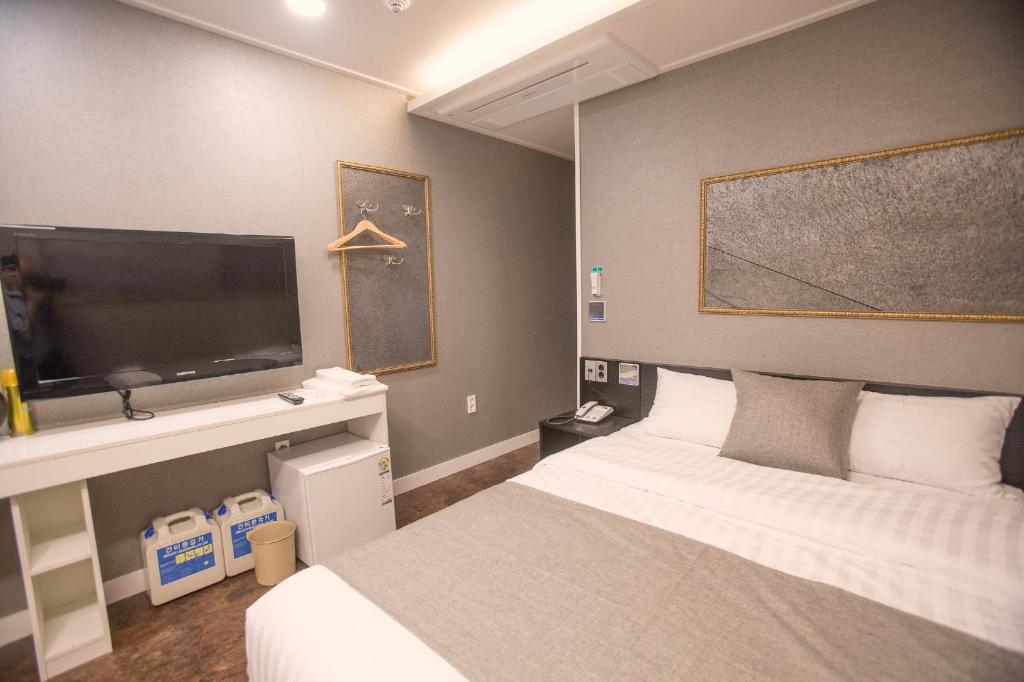 Postel nebo postele na pokoji v ubytování Major Hotel 2