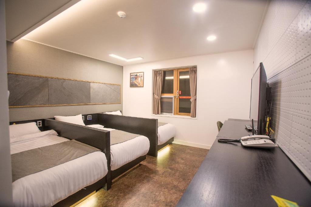 TV a/nebo společenská místnost v ubytování Major Hotel 2