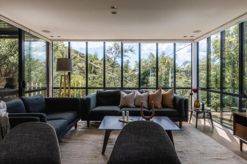 Posezení v ubytování The Palm Beach Treehouse