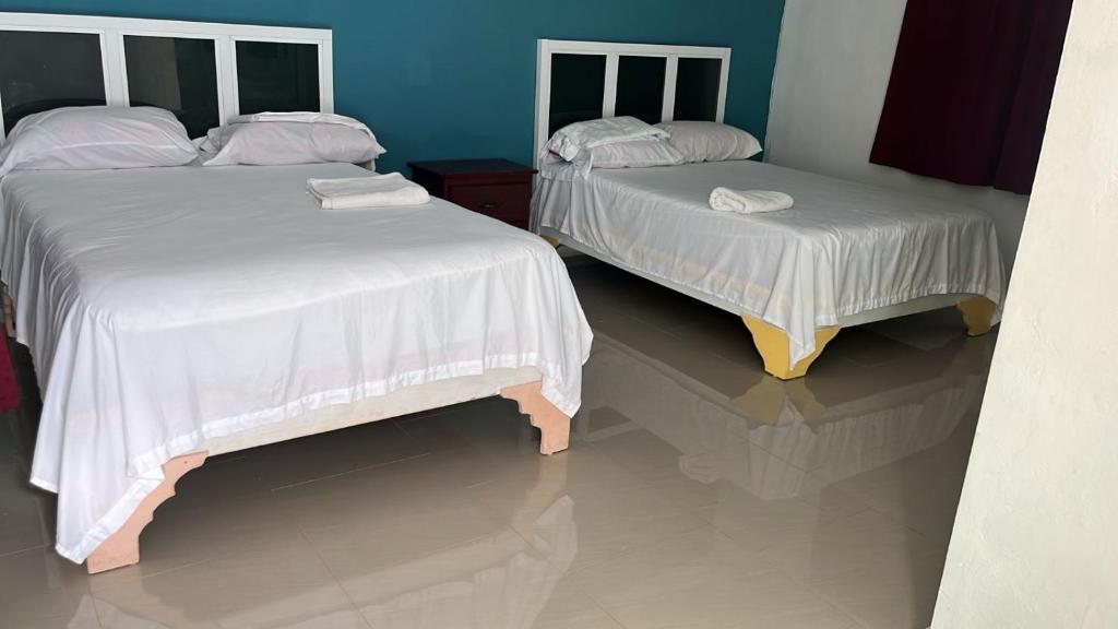 Postel nebo postele na pokoji v ubytování Hotel Ryluc