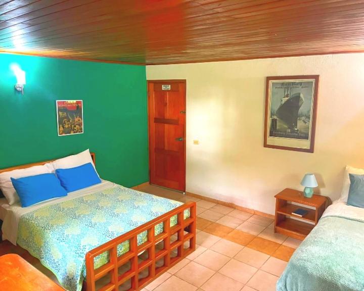 Ένα ή περισσότερα κρεβάτια σε δωμάτιο στο La Lune Topaz