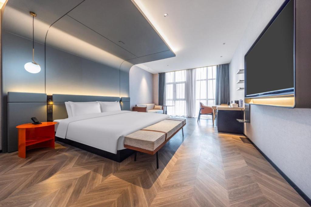 Postel nebo postele na pokoji v ubytování Xingyue Hotel Wangjiang West Road Innovation Industrial Park Branch