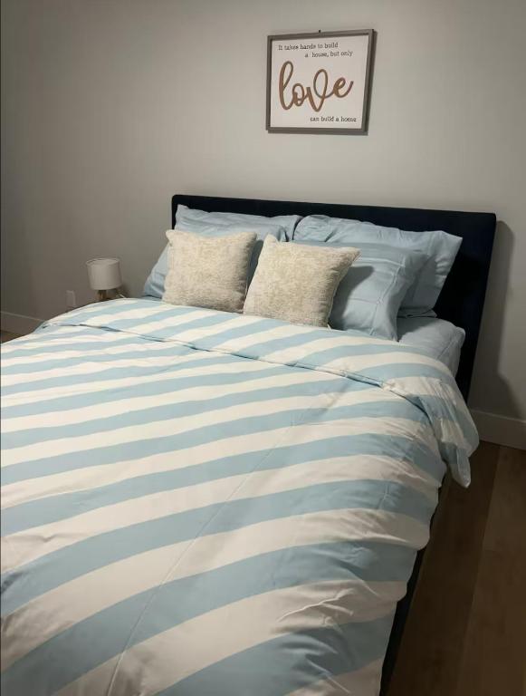 En eller flere senge i et værelse på Cozynest