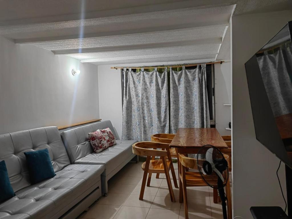 Et opholdsområde på Quiet apartment in Itagui