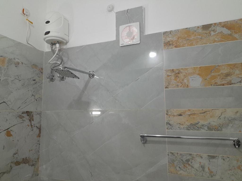 Phòng tắm tại Janhvi Cottage