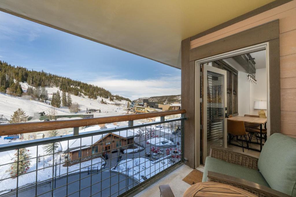 a balcony with a view of a ski resort at Select Unit 2509 - Zephyr Mountain Lodge condo in Winter Park