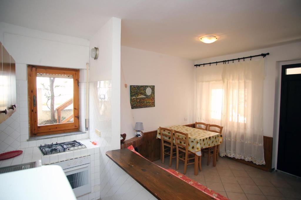Posedenie v ubytovaní Appartamenti Mare Blu