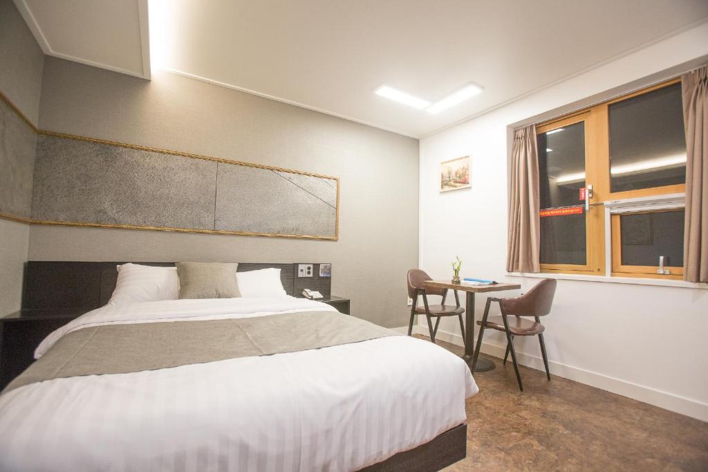 Postel nebo postele na pokoji v ubytování Major Hotel 2