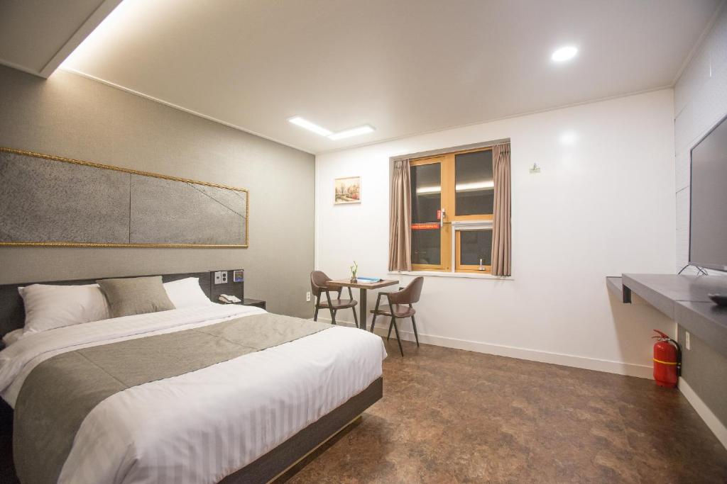 Postel nebo postele na pokoji v ubytování Major Hotel 2