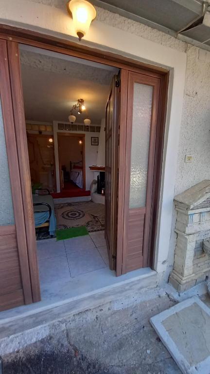 Balkón nebo terasa v ubytování Ξενών ΗΧΩ