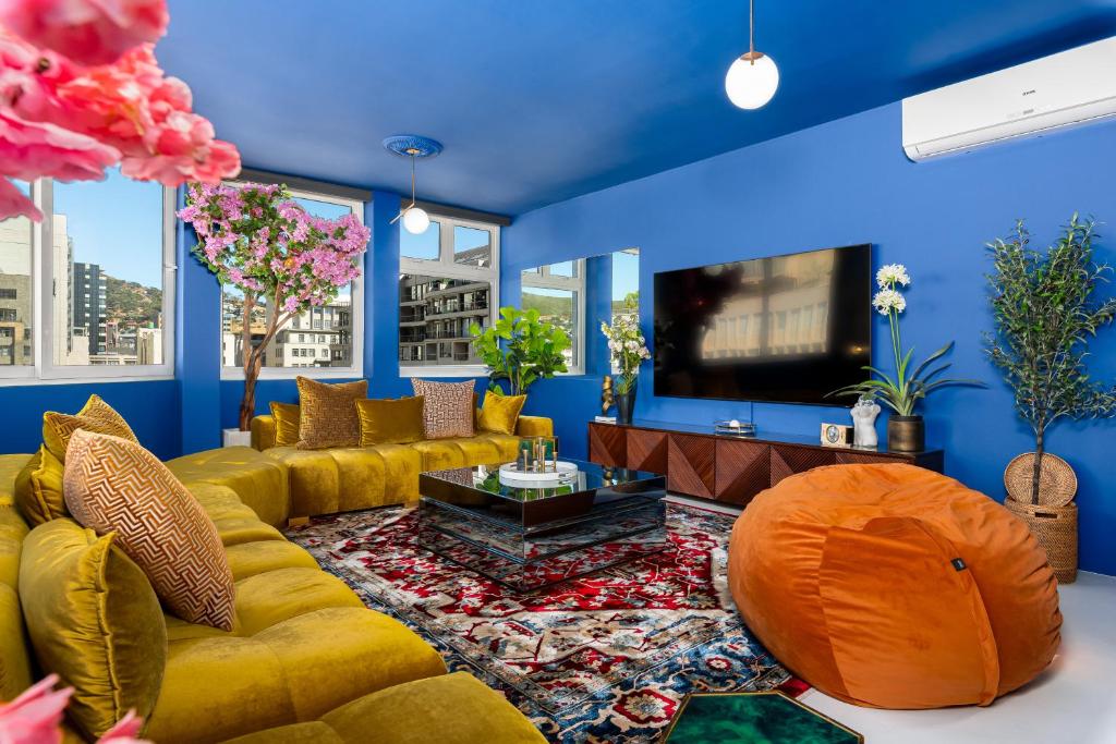 Et tv og/eller underholdning på Luxury Penthouse with Mountain Views