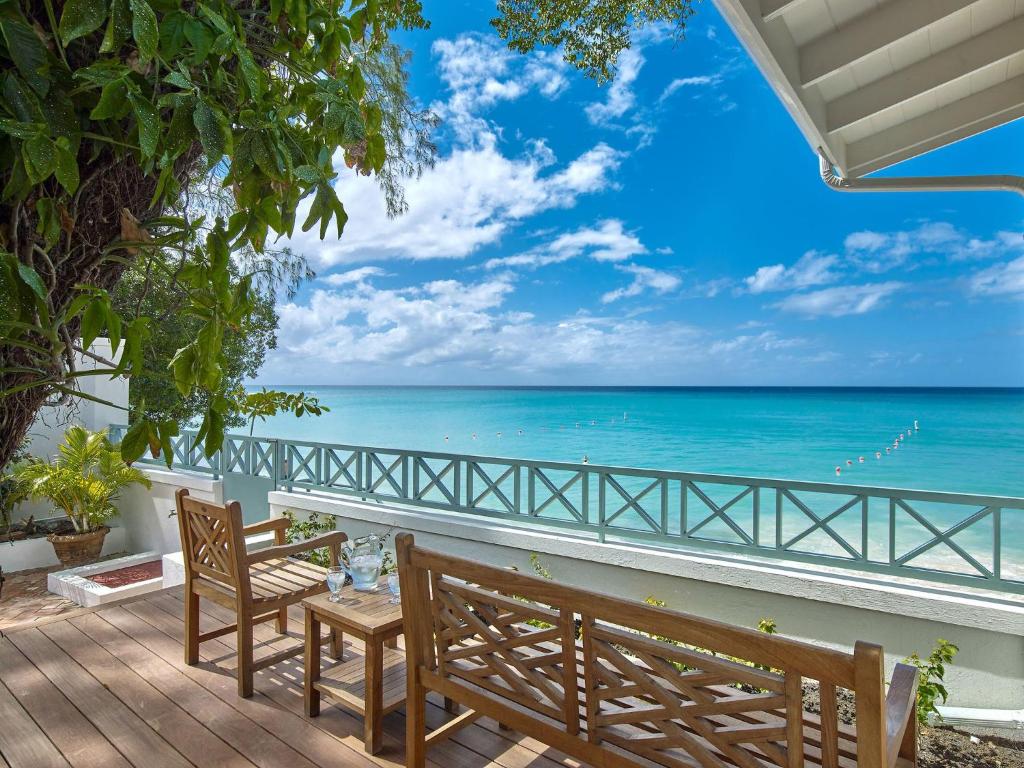 a view of the ocean from the balcony of a resort at Southwinds - by ZenBreak in Saint Peter