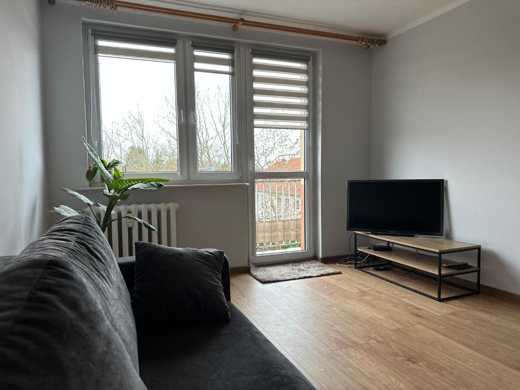 Et tv og/eller underholdning på Lakes & Castles Apartment