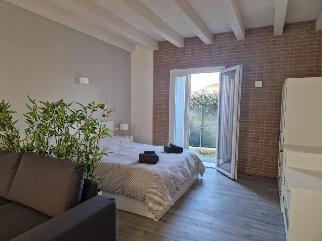 Giường trong phòng chung tại Tiramisù incluso - by Flora