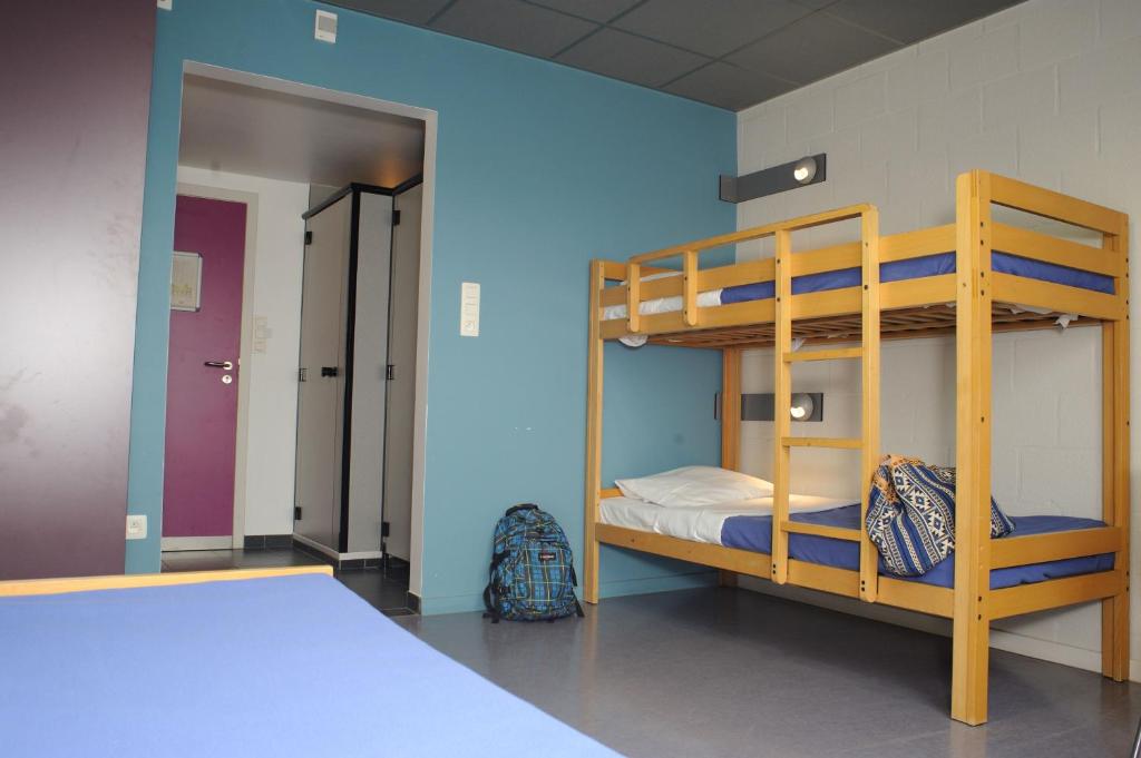 Postel nebo postele na pokoji v ubytování Hostel De Veurs