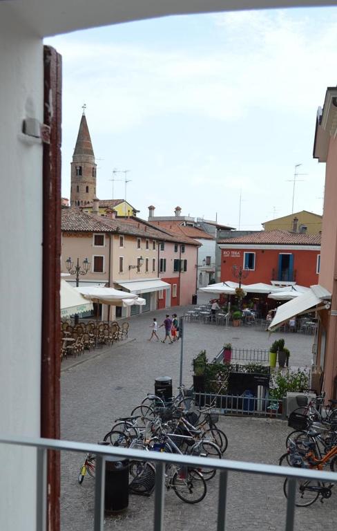 a group of bikes parked in a courtyard at Casa Leone 1 in Caorle