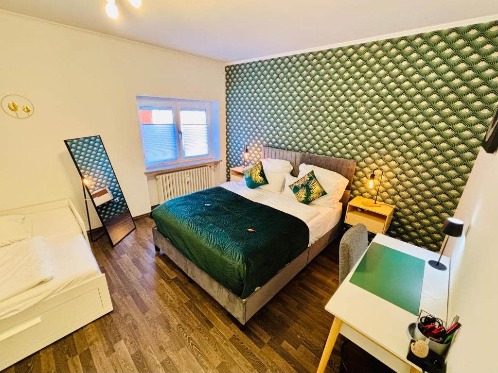 En eller flere senge i et værelse på Stilvolles Wohlfühl-Apartment nahe Bahnhof