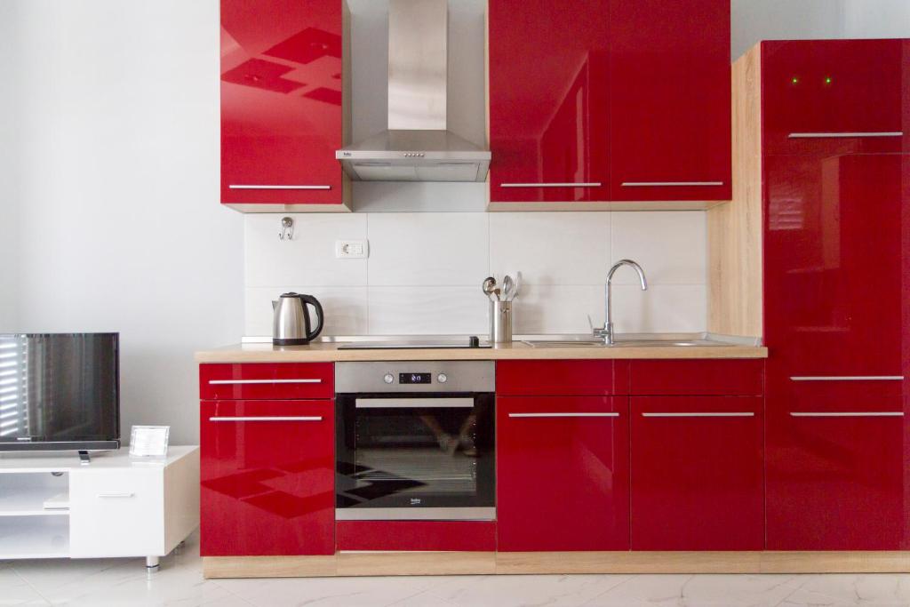 Kuchyňa alebo kuchynka v ubytovaní Modrika Apartments
