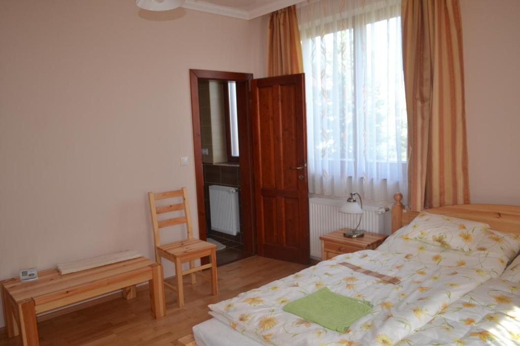 Módos Falusi Szálláshely - Deluxe-Dreibettzimmer