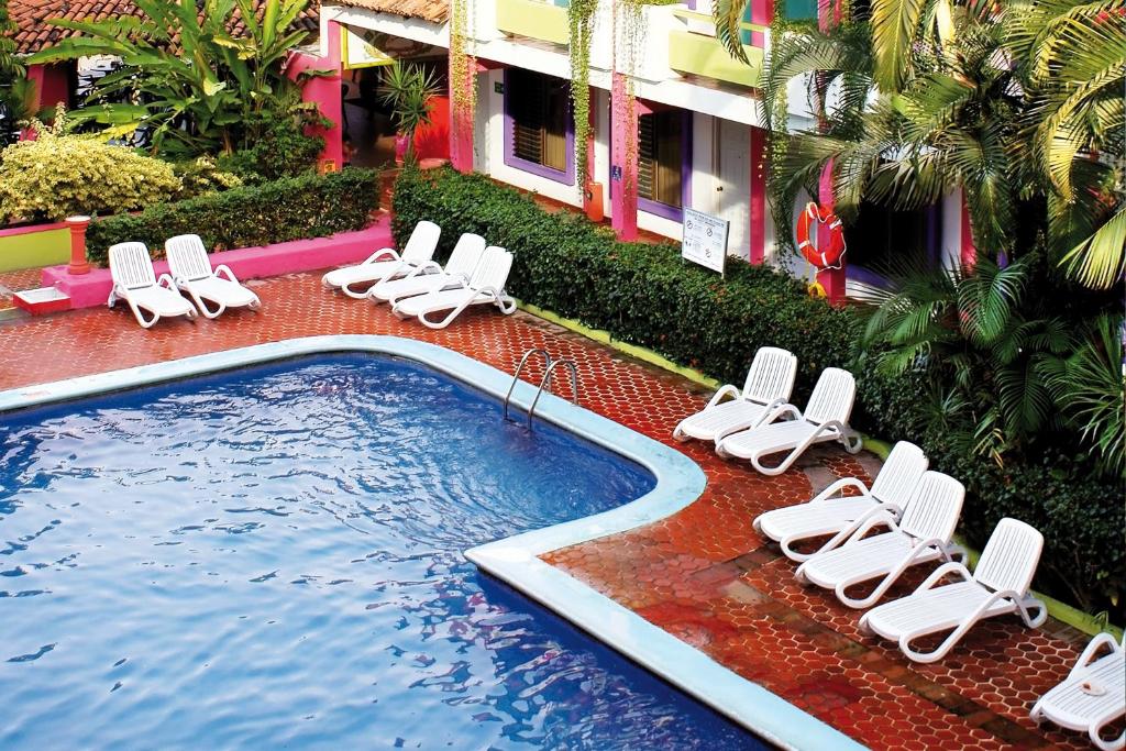 Bazén v ubytování Decameron Los Cocos Guayabitos, Ramada All-Inclusive Resort nebo v jeho okolí